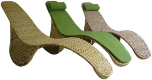 Arching lounge chair made entirely of cane weave ideal for relaxing.